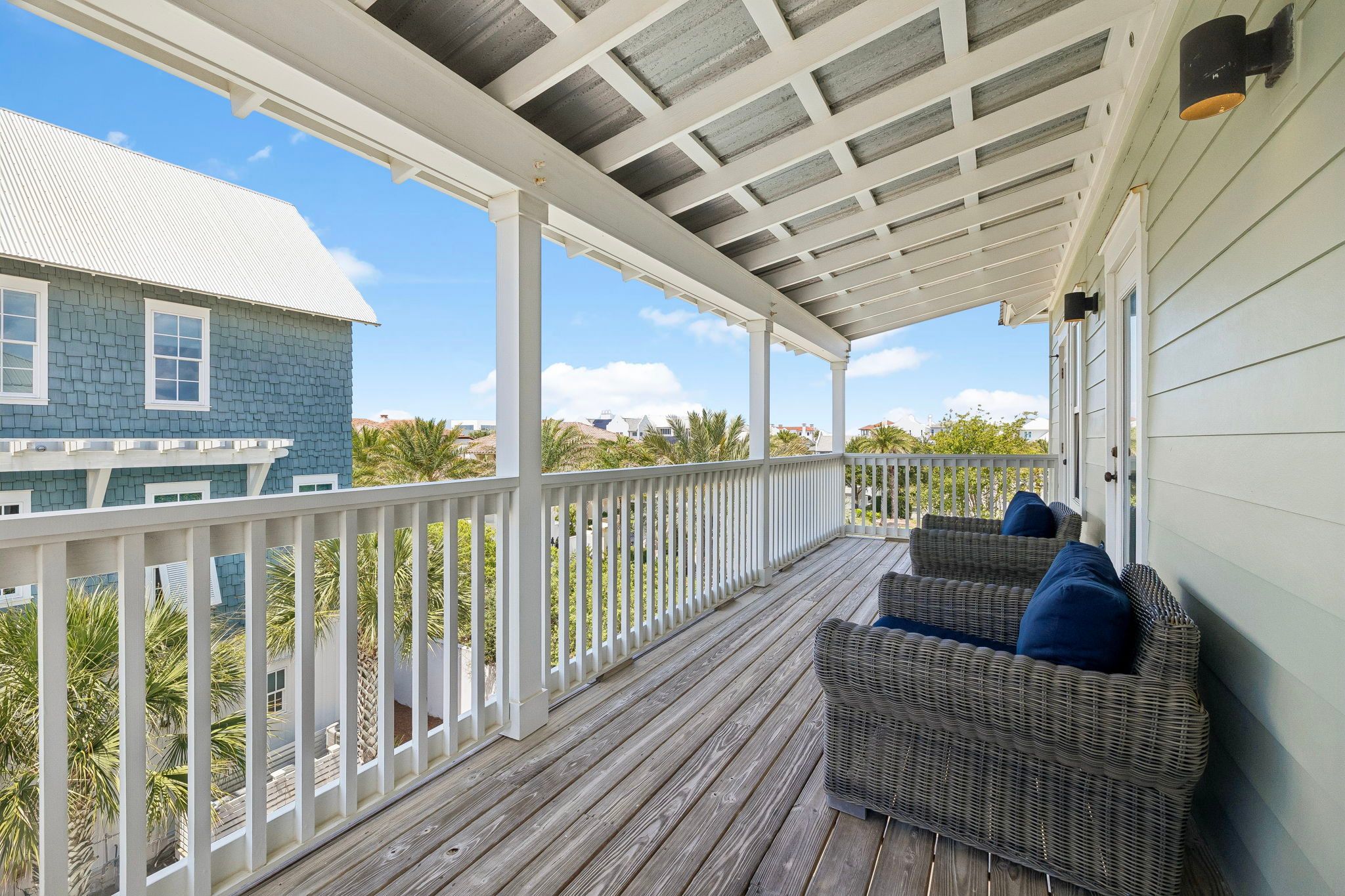 Covered 3rd-floor balcony off the King suites