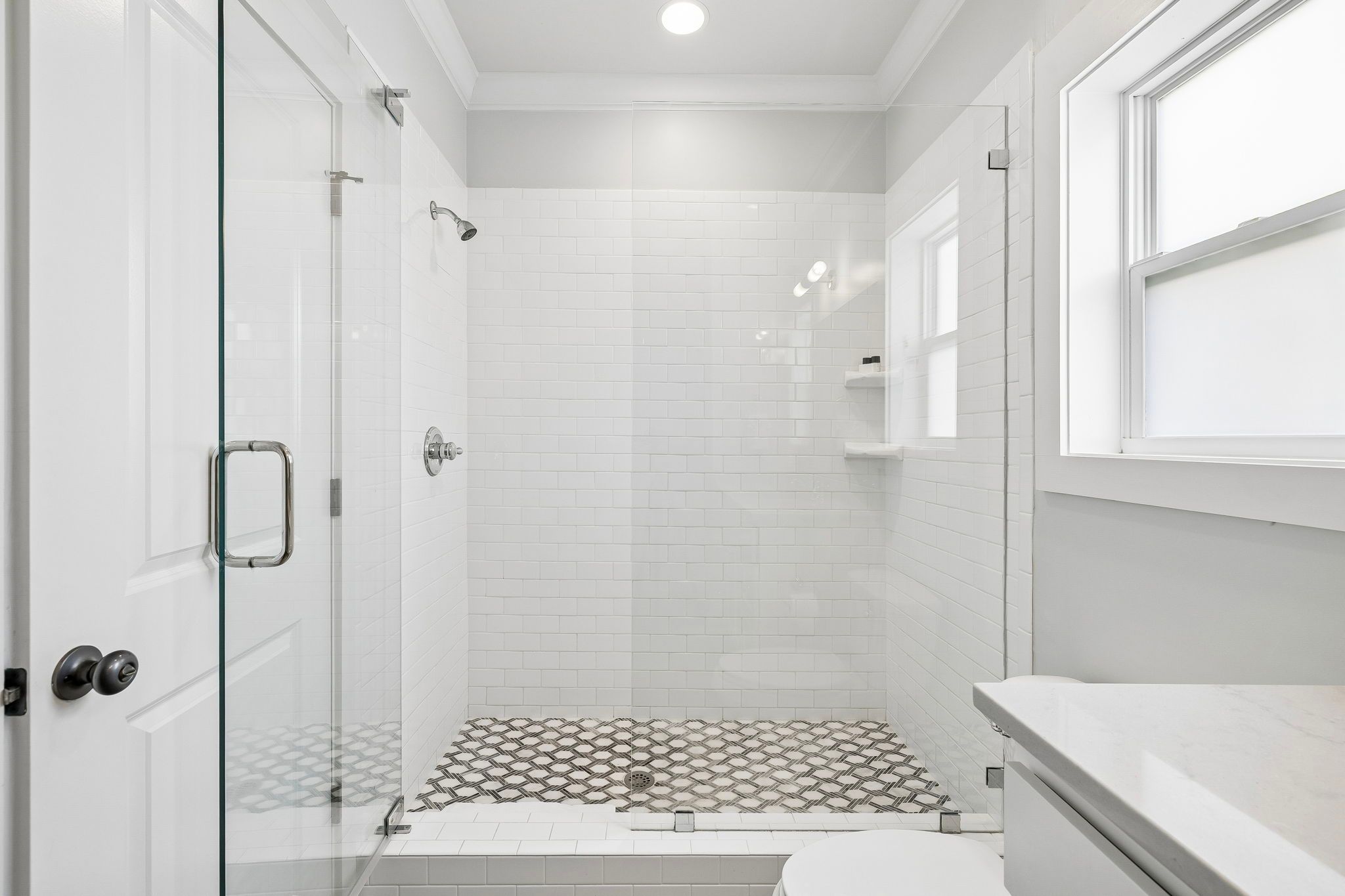 Frameless glass shower in this en-suite