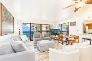 Bright living room with stunning ocean backdrop Bright living room with stunning ocean backdrop