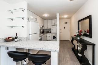 Washer and Dryer Conveniently Located Inside the Condo Washer and Dryer Conveniently Located Inside the Condo
