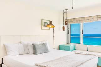 Wake up to endless blue ocean views in paradise Wake up to endless blue ocean views in paradise