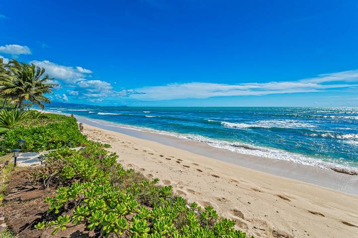 A secluded beach awaits mere steps away A secluded beach awaits mere steps away