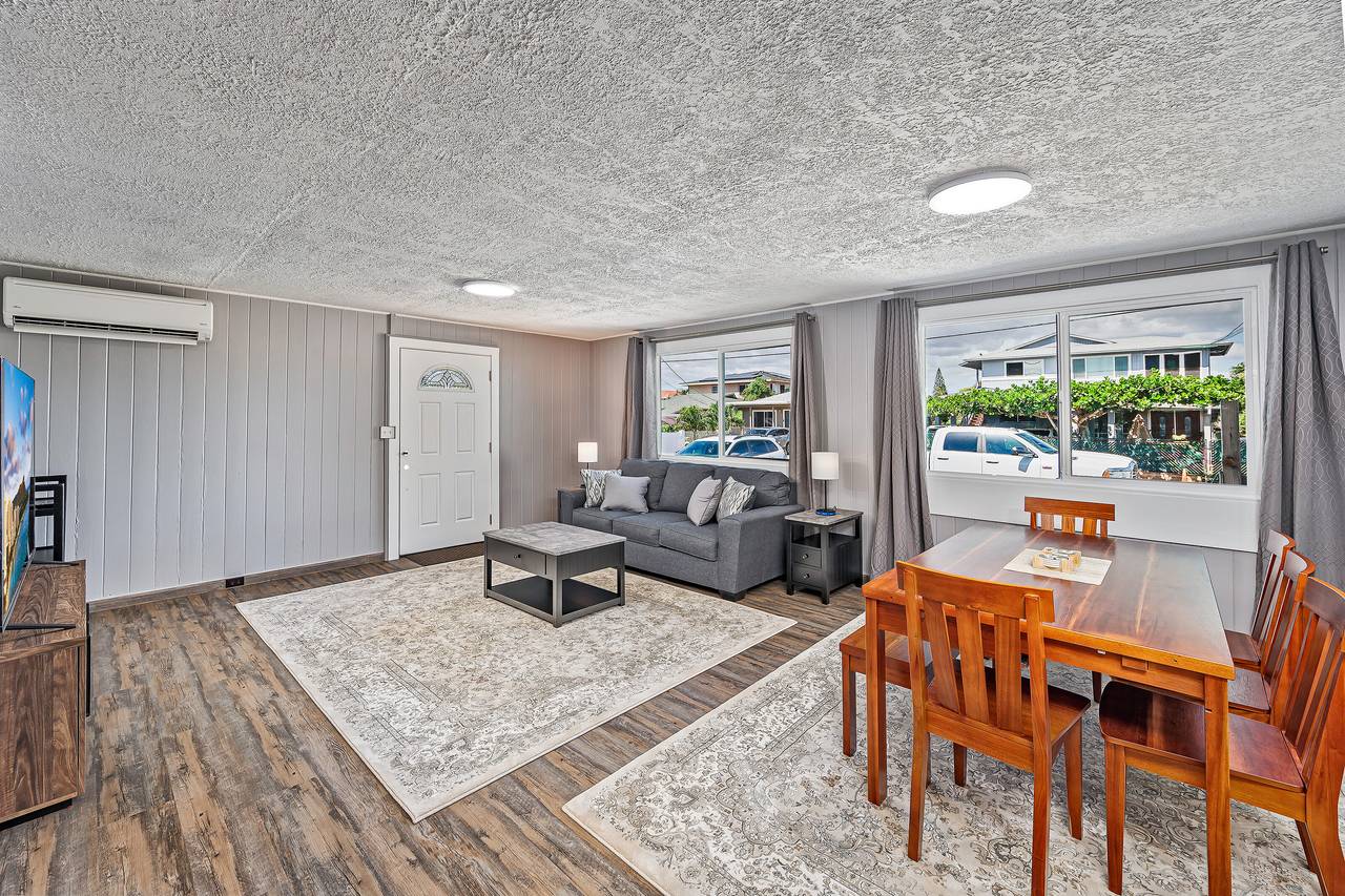 Spacious living room with picture windows Spacious living room with picture windows