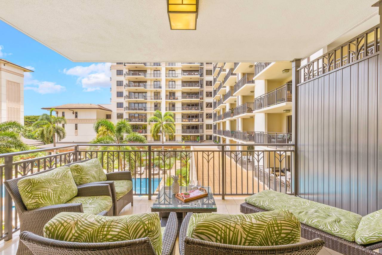 Your private balcony oasis overlooking the sparkling pool Your private balcony oasis overlooking the sparkling pool