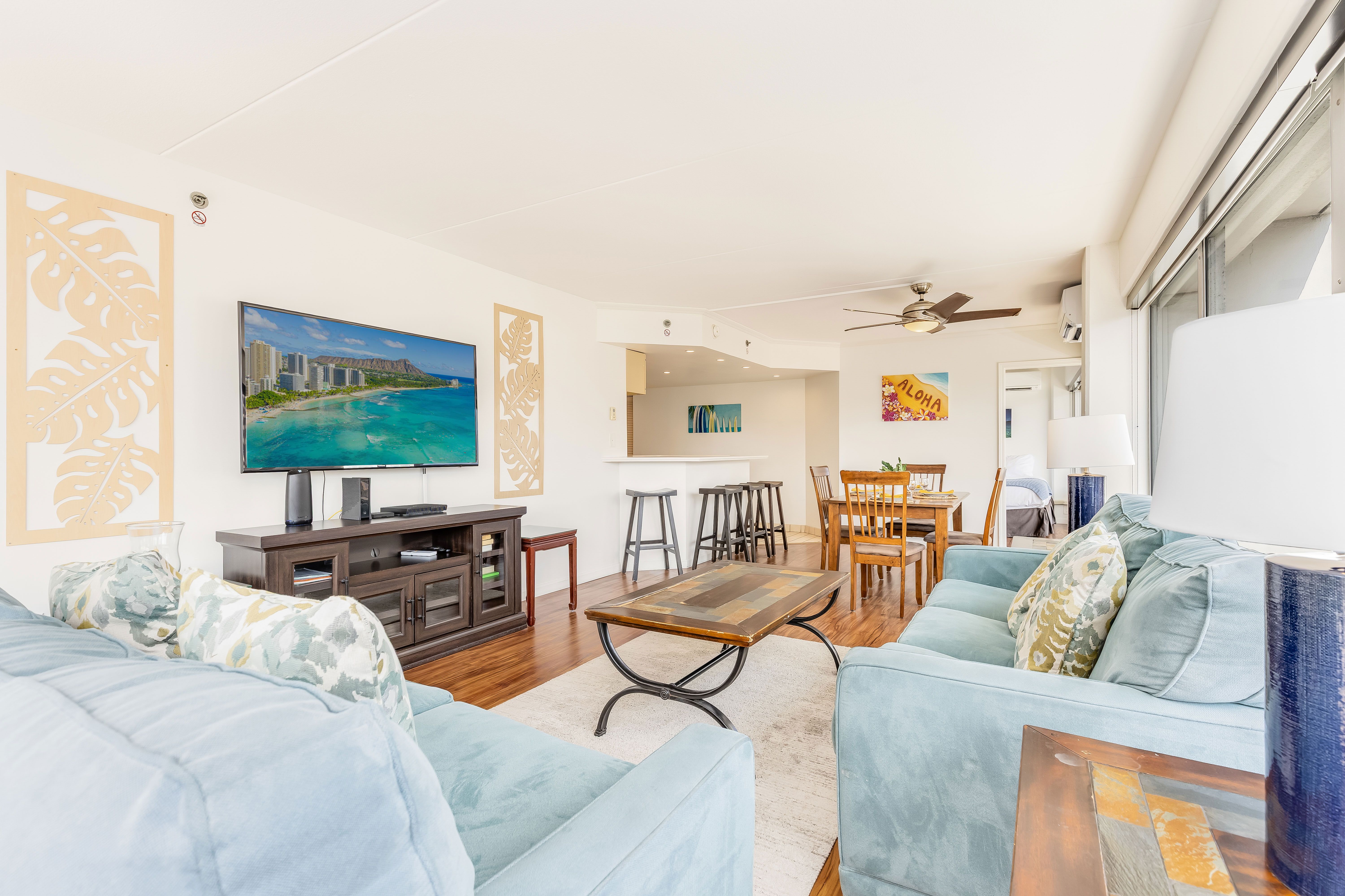 A cozy living room made for relaxing after a day in paradise
