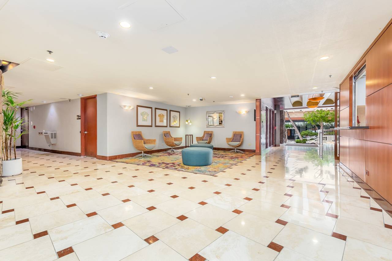 Lobby with Lounge Area and Manager's Office Lobby with Lounge Area and Manager's Office