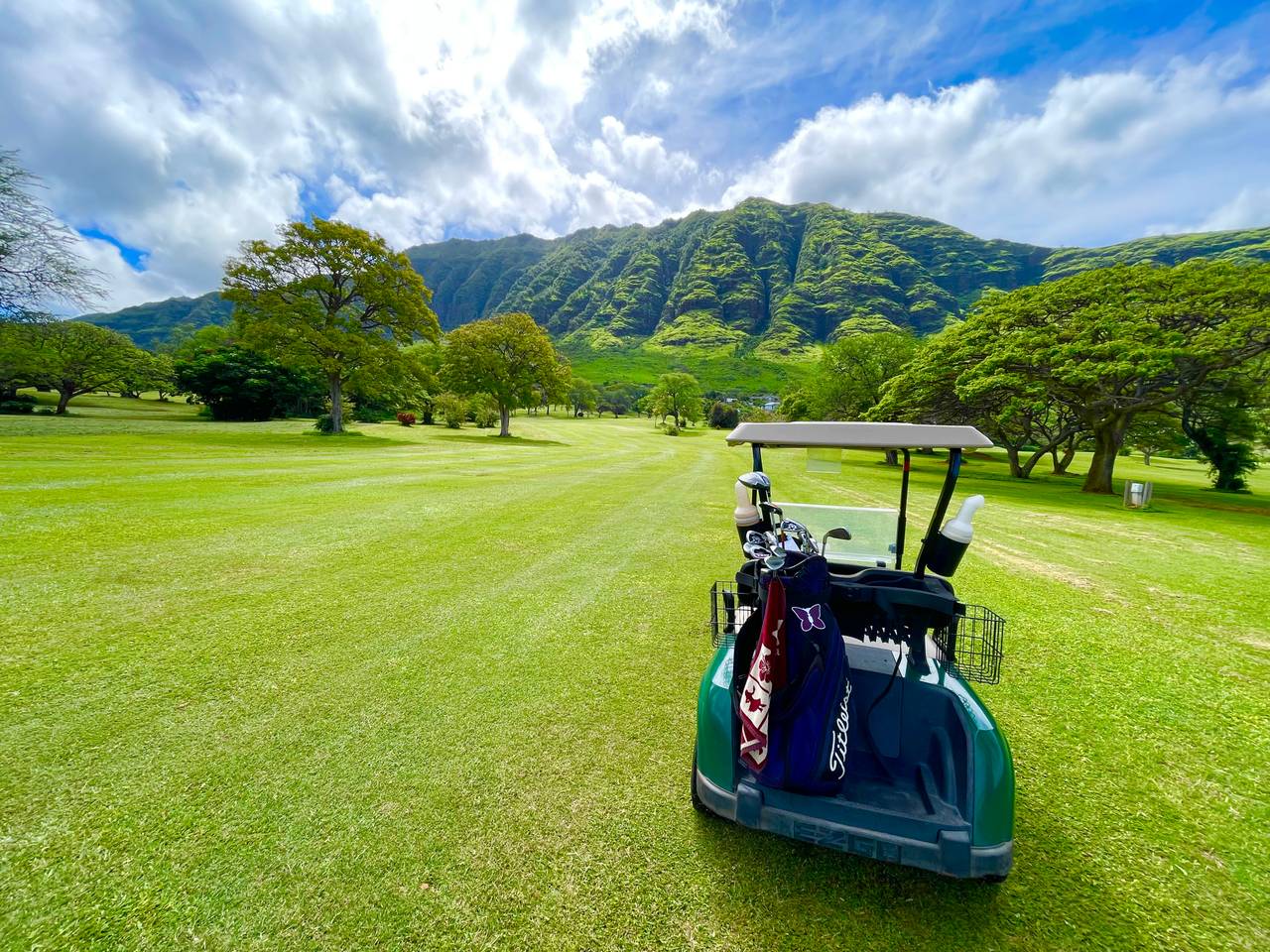 Enjoying a round of golf with a stunning view of the mountains Enjoying a round of golf with a stunning view of the mountains
