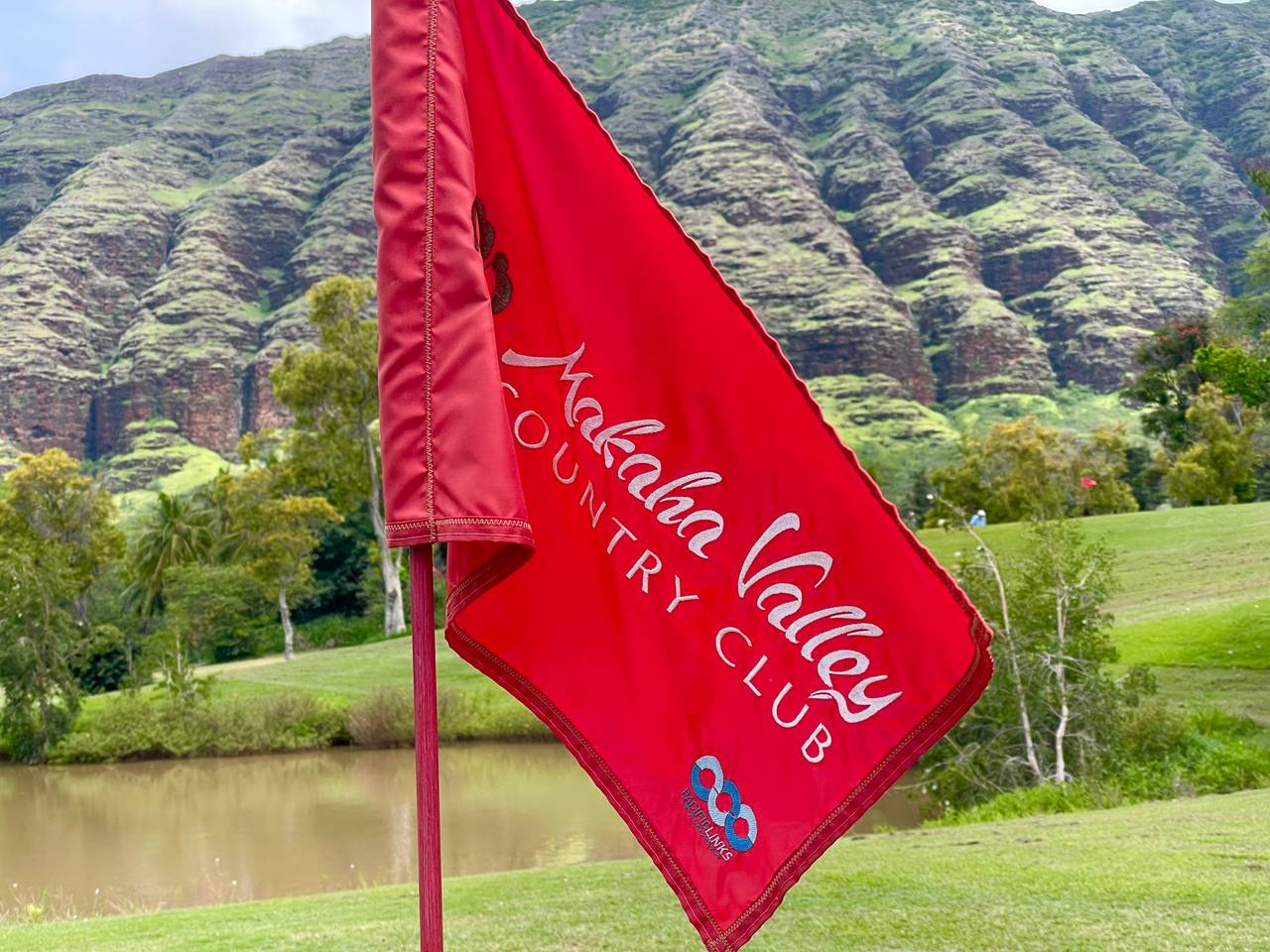 Teeing off with a picturesque backdrop of mountains Teeing off with a picturesque backdrop of mountains