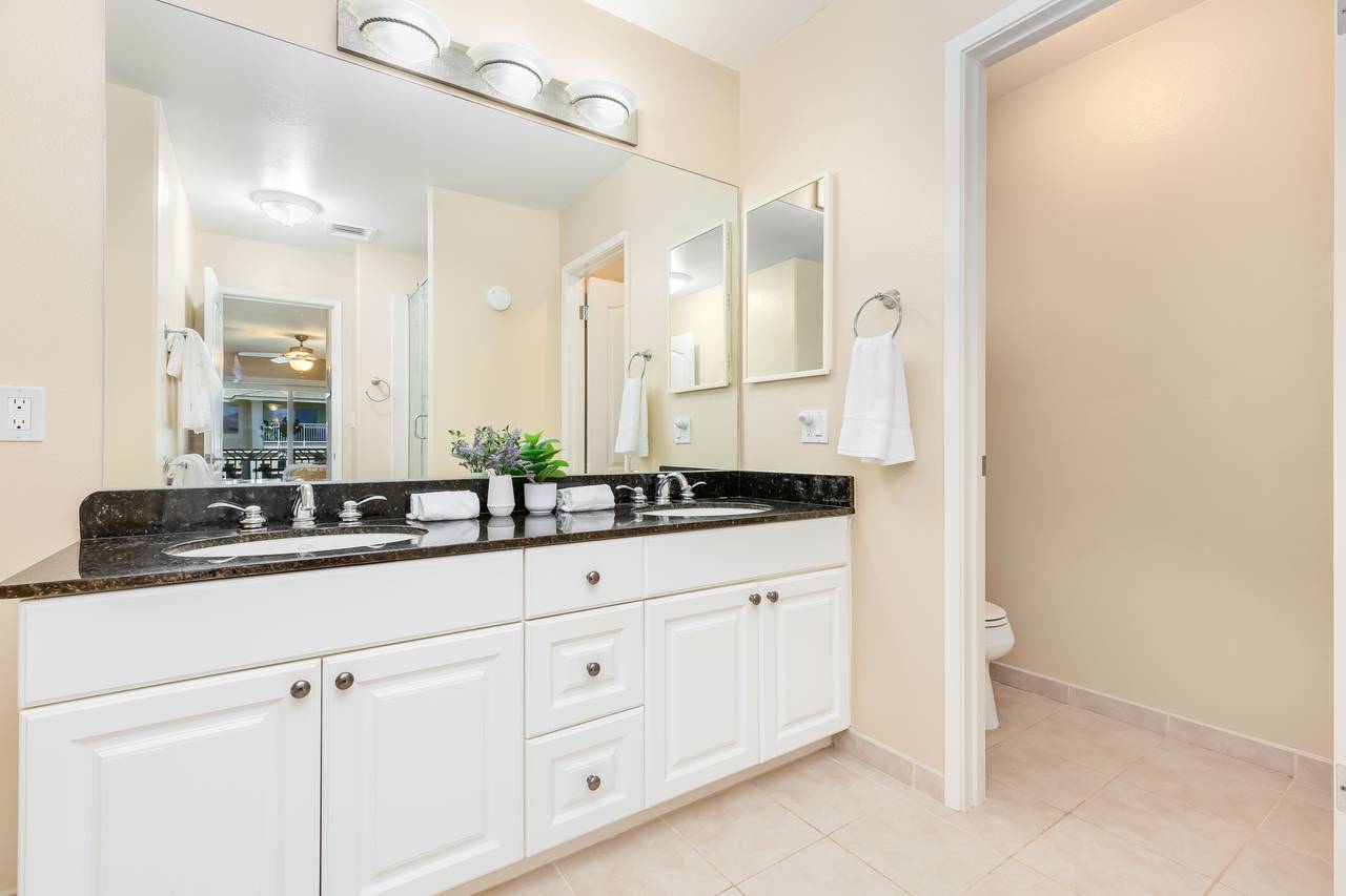 Step into luxury with this stunning bathroom featuring double si Step into luxury with this stunning bathroom featuring double si