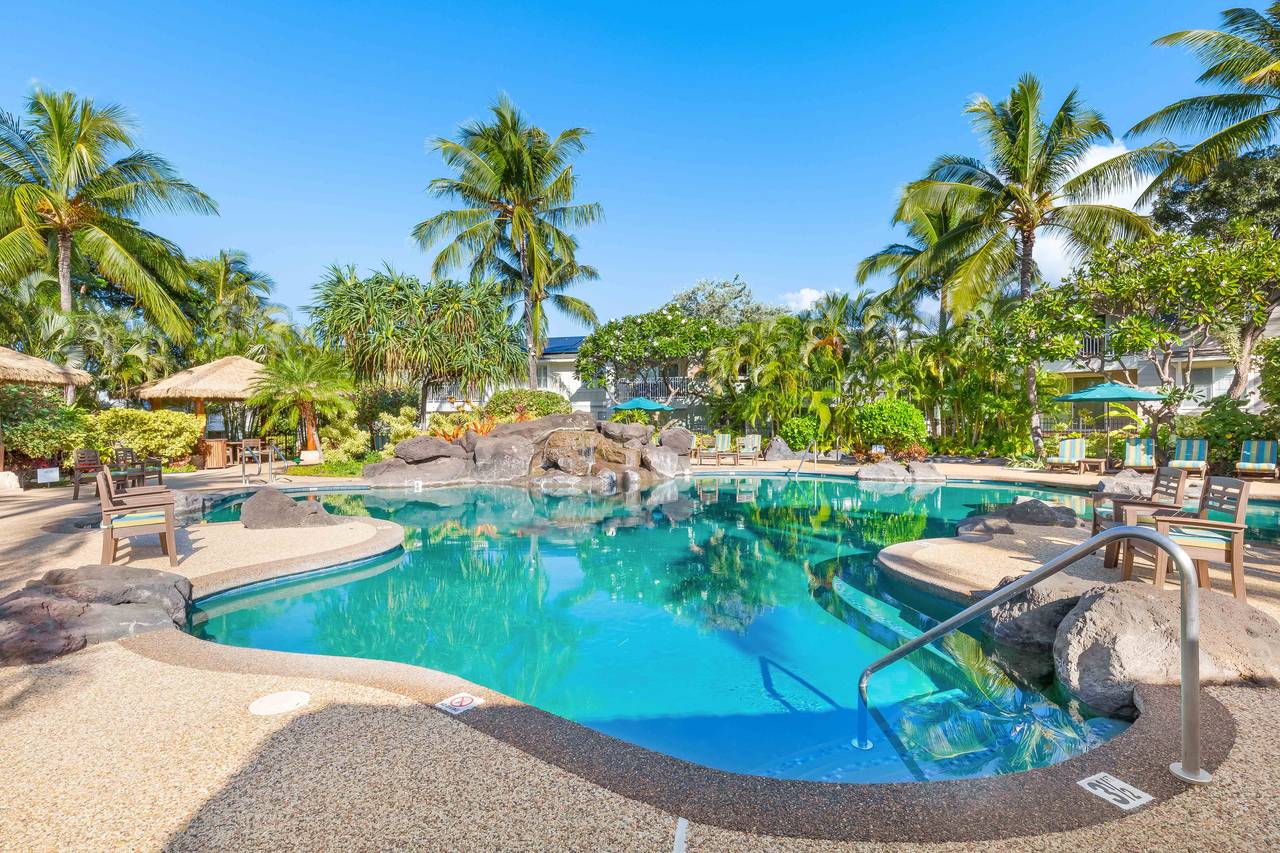 Luxurious pool with waterfall and a relaxing jacuzzi Luxurious pool with waterfall and a relaxing jacuzzi