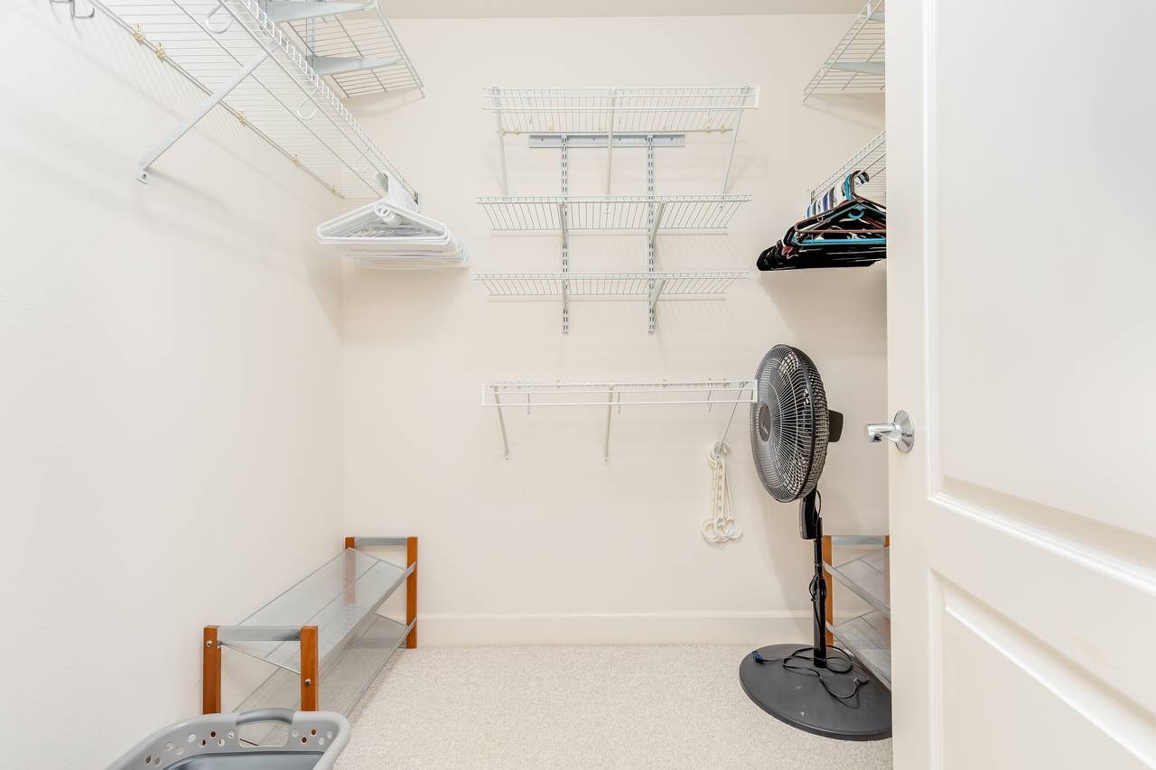 Master bedroom walk-in closet Master bedroom walk-in closet