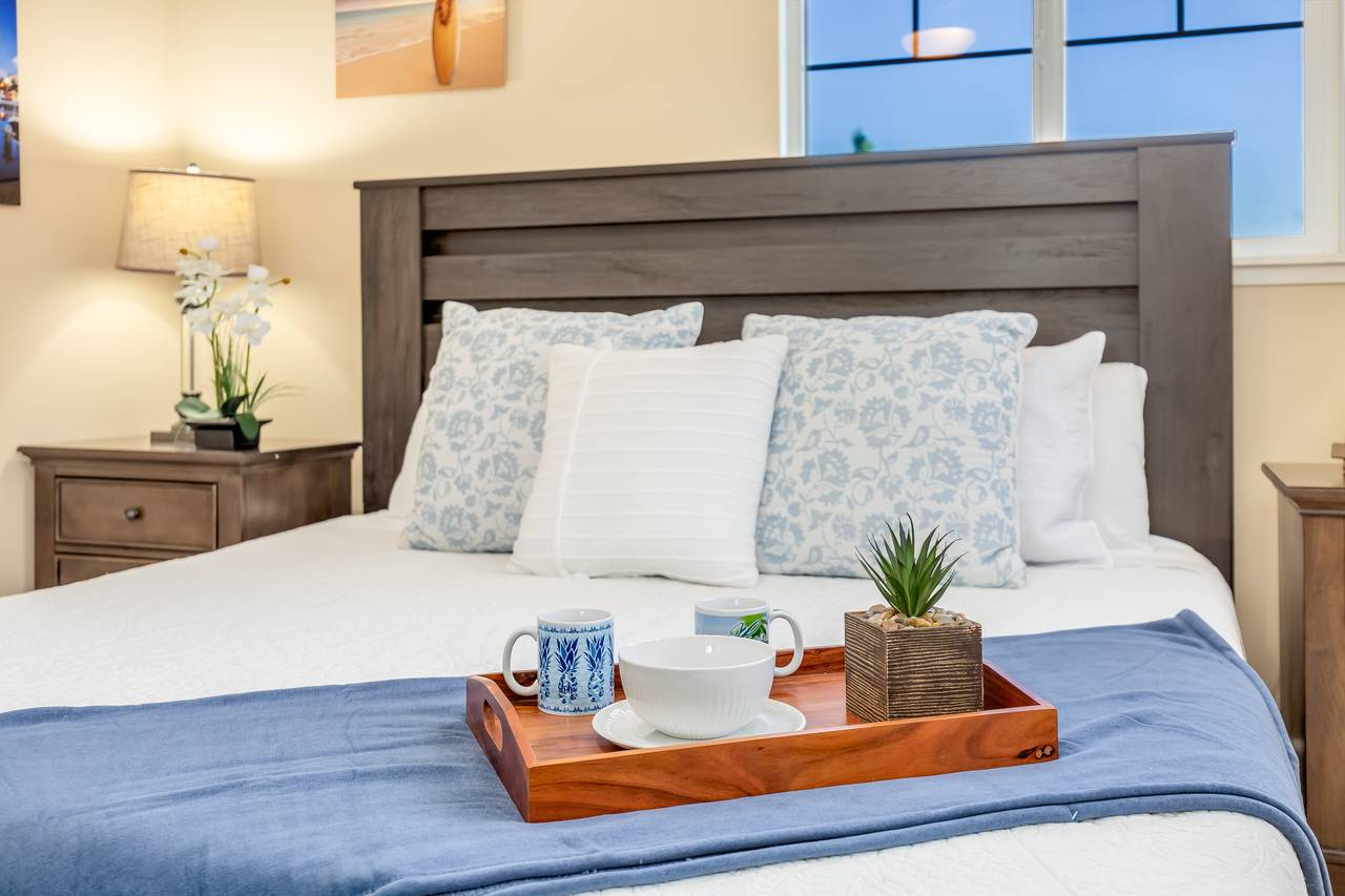 Luxuriating in the comfort of a king-sized bed in Luxuriating in the comfort of a king-sized bed in