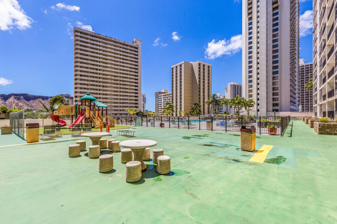 Recreation area with BBQ grill and playground Recreation area with BBQ grill and playground