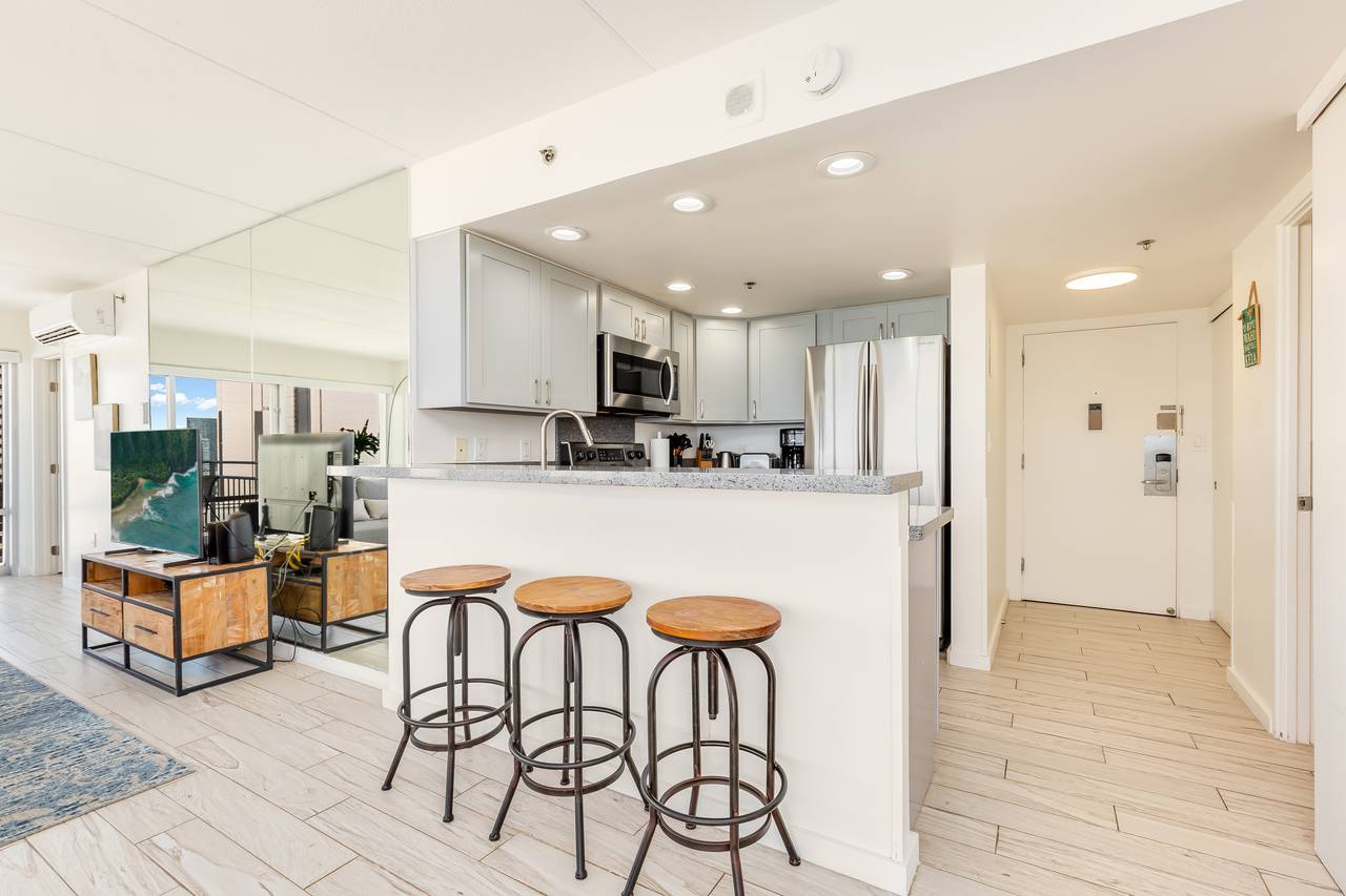 A kitchen island with bar stools is the epitome of modern living A kitchen island with bar stools is the epitome of modern living