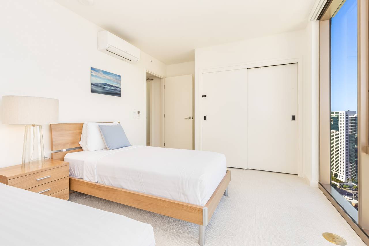 Well-appointed bedroom with a large closet Well-appointed bedroom with a large closet