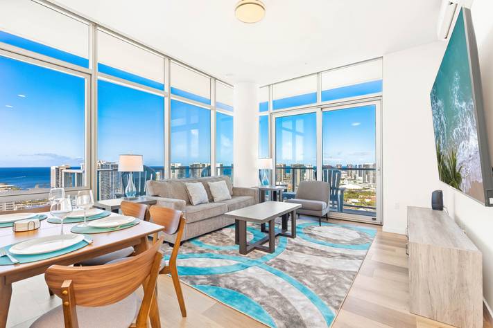 Relax in style with a living room with breathtaking ocean views Relax in style with a living room with breathtaking ocean views