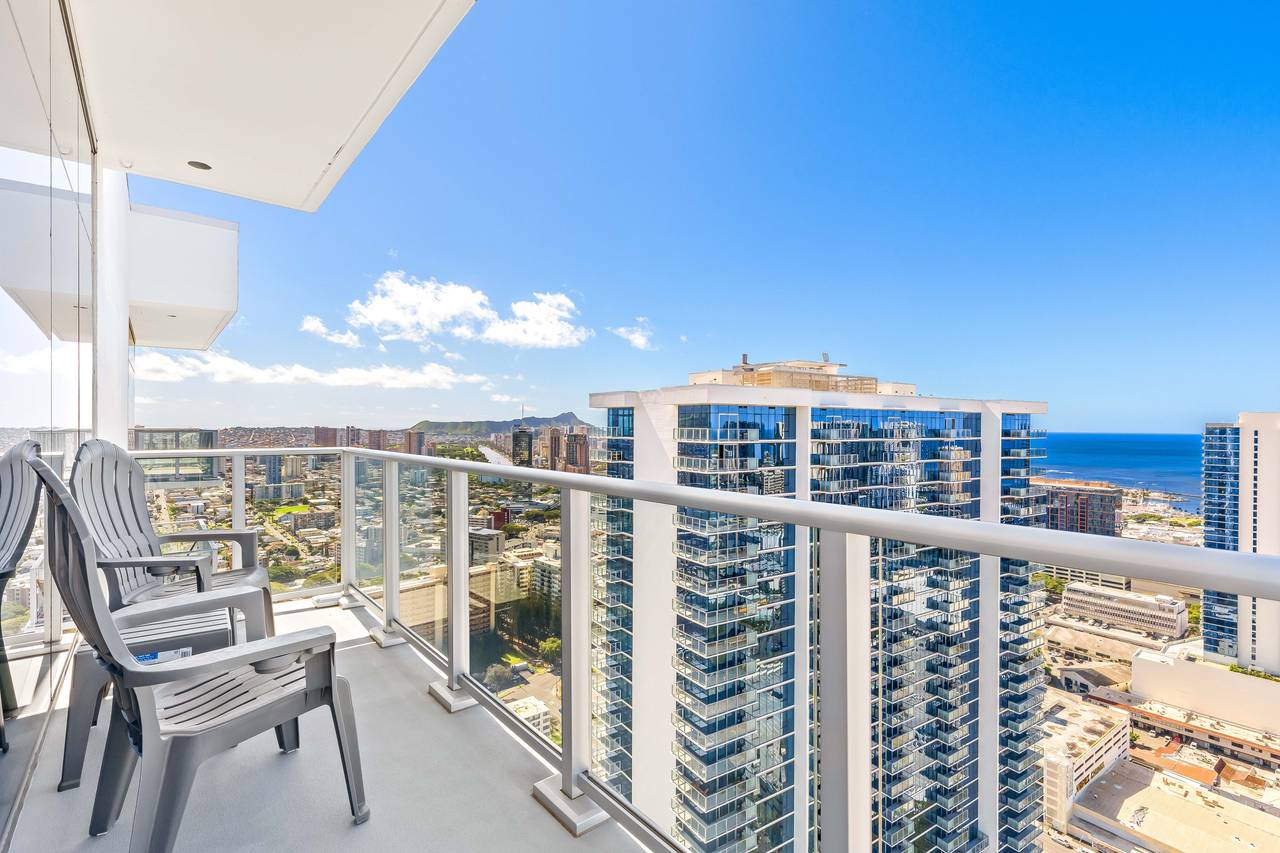 Private high-floor balcony with sweeping ocean views Private high-floor balcony with sweeping ocean views