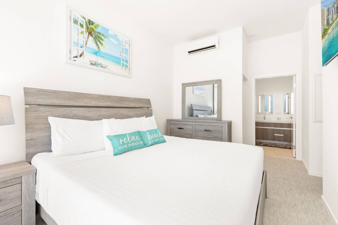 Master bedroom with a king bed Master bedroom with a king bed