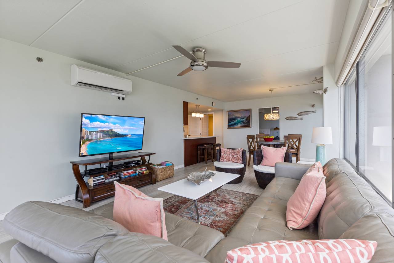 Comfortable living room with TV and split AC Comfortable living room with TV and split AC