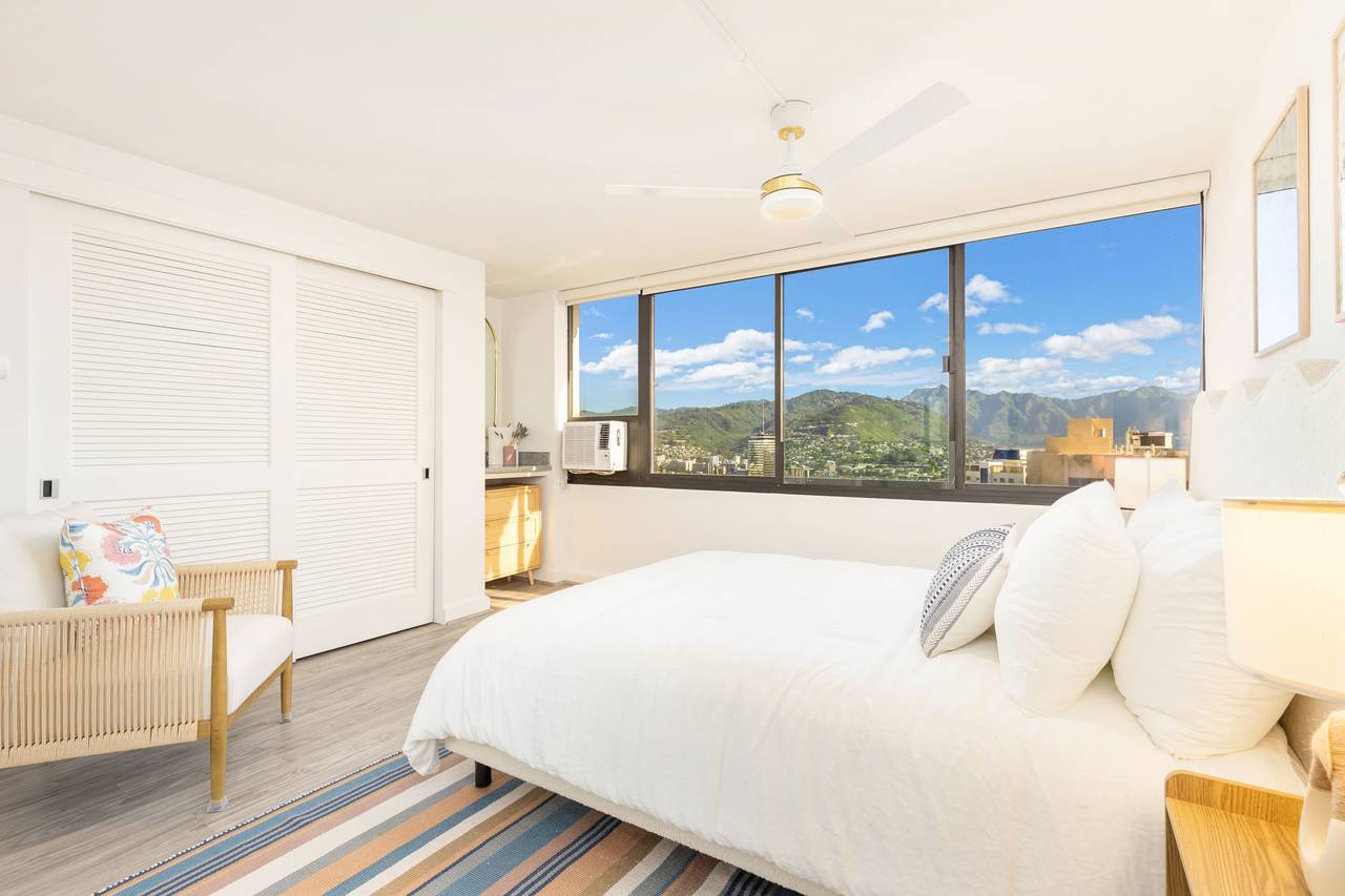 Stylish bedroom featuring a queen bed Stylish bedroom featuring a queen bed