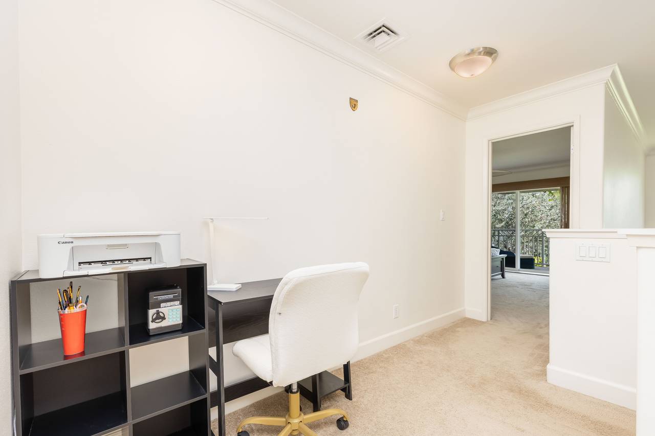 Hallway with a desk for remote workers Hallway with a desk for remote workers