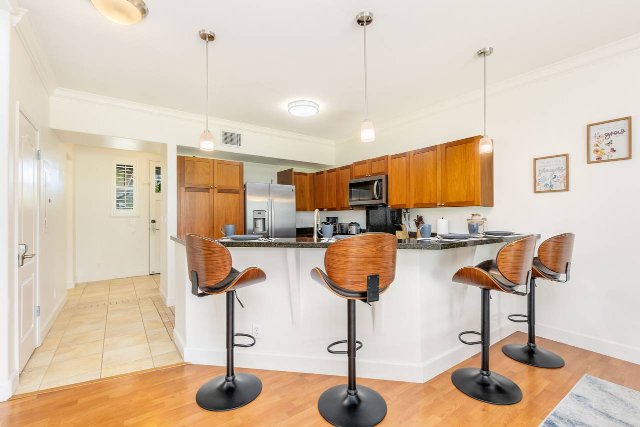 Gather, prep, and enjoy around the kitchen island Gather, prep, and enjoy around the kitchen island