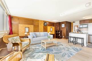 A spacious living room designed for comfort and relaxation A spacious living room designed for comfort and relaxation