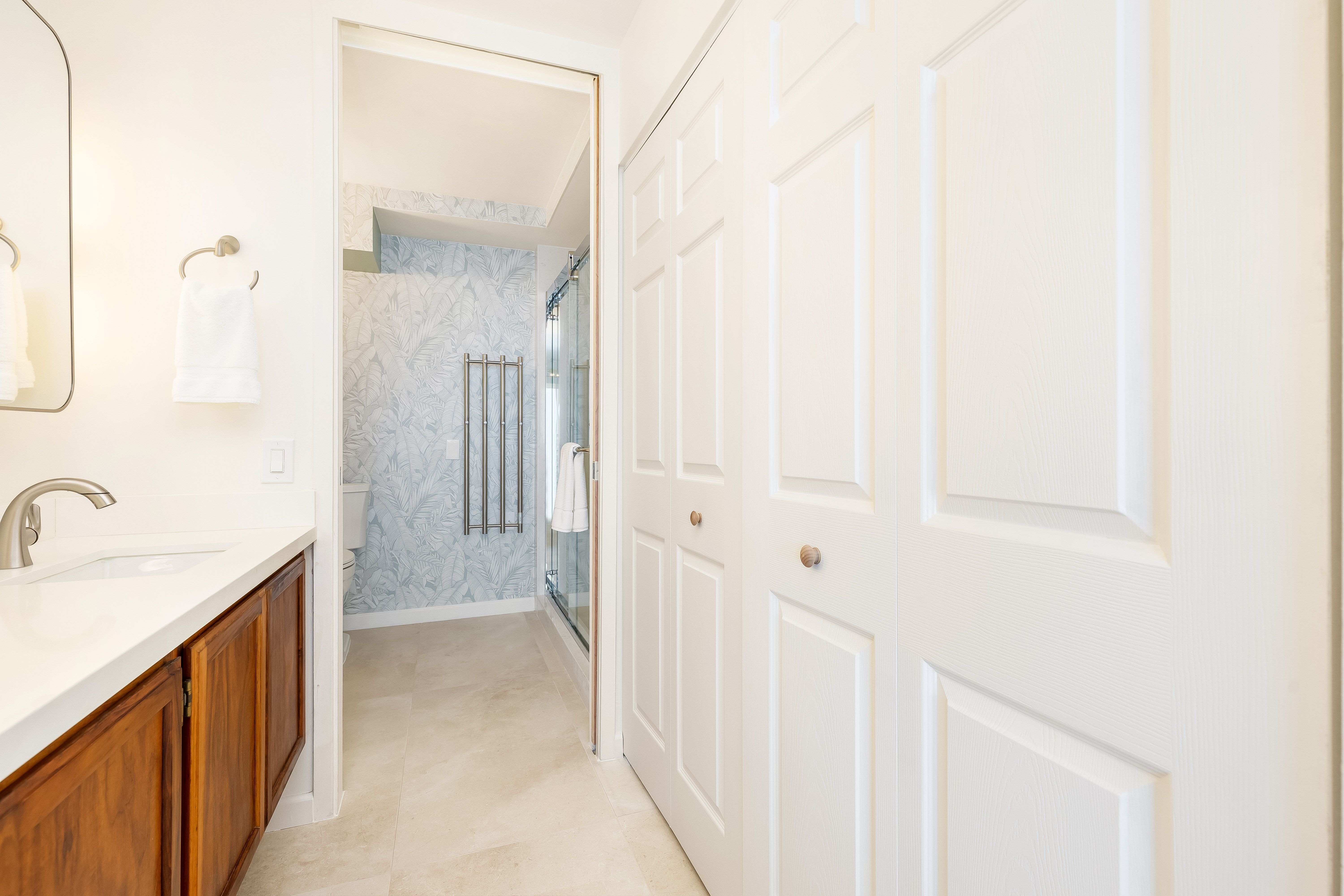 Private vanity separate from the shower and toilet
