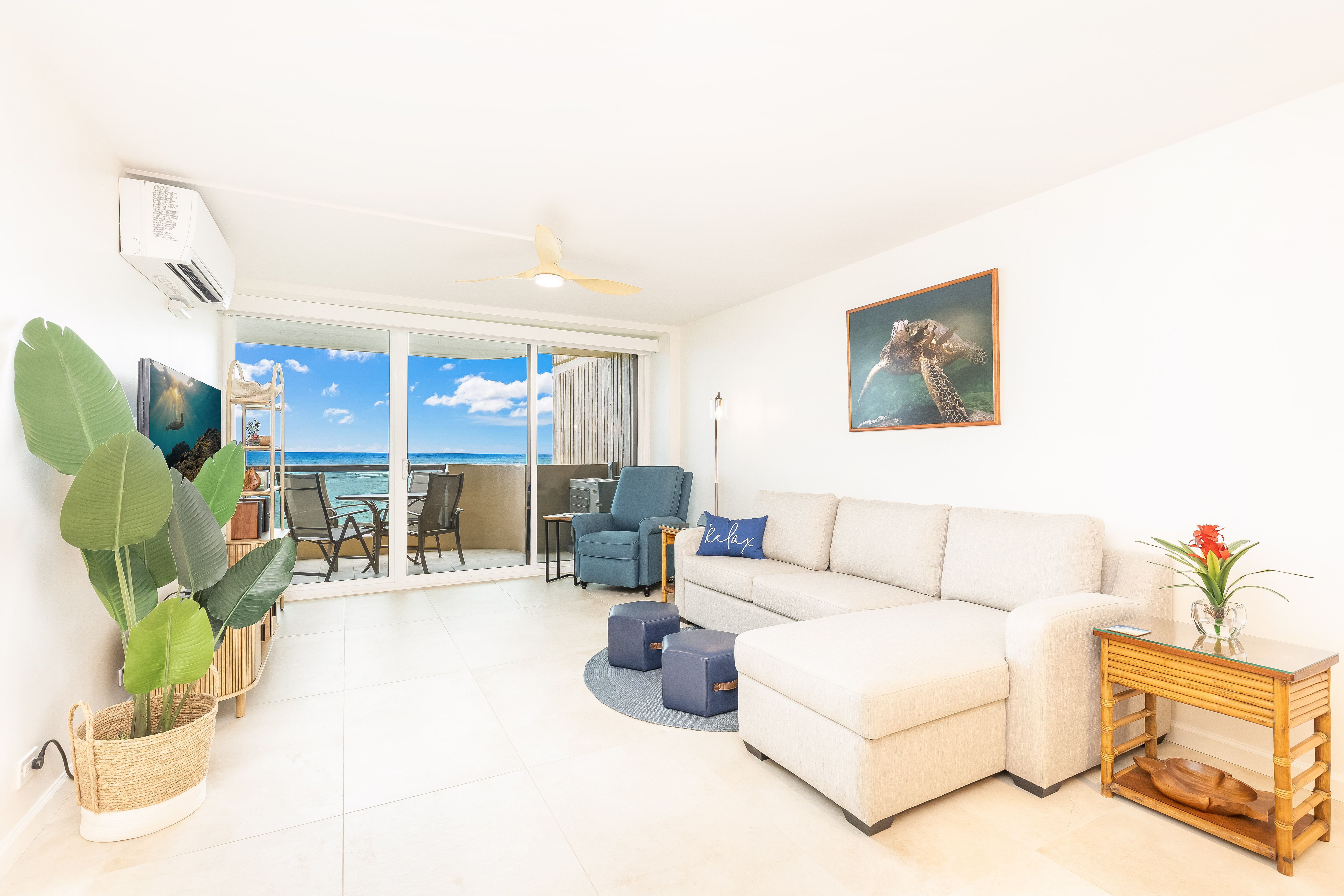 Spacious living room framed by beautiful ocean views