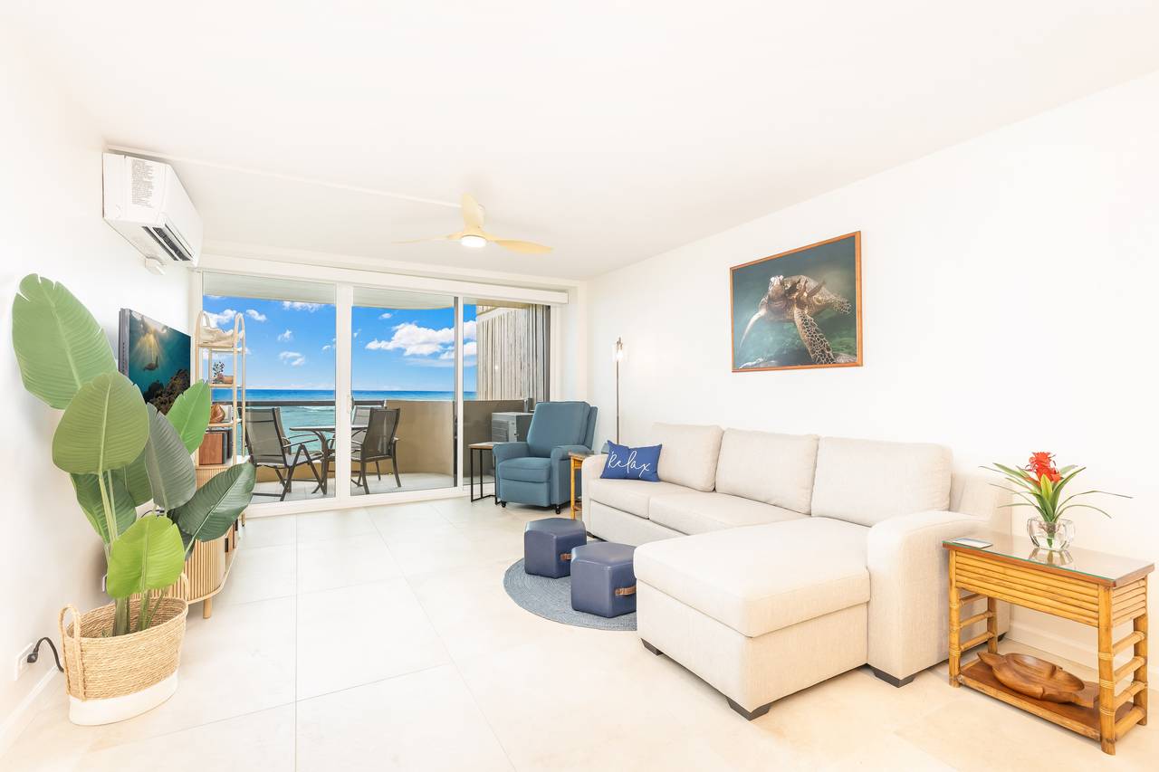 Spacious living room framed by beautiful ocean views Spacious living room framed by beautiful ocean views