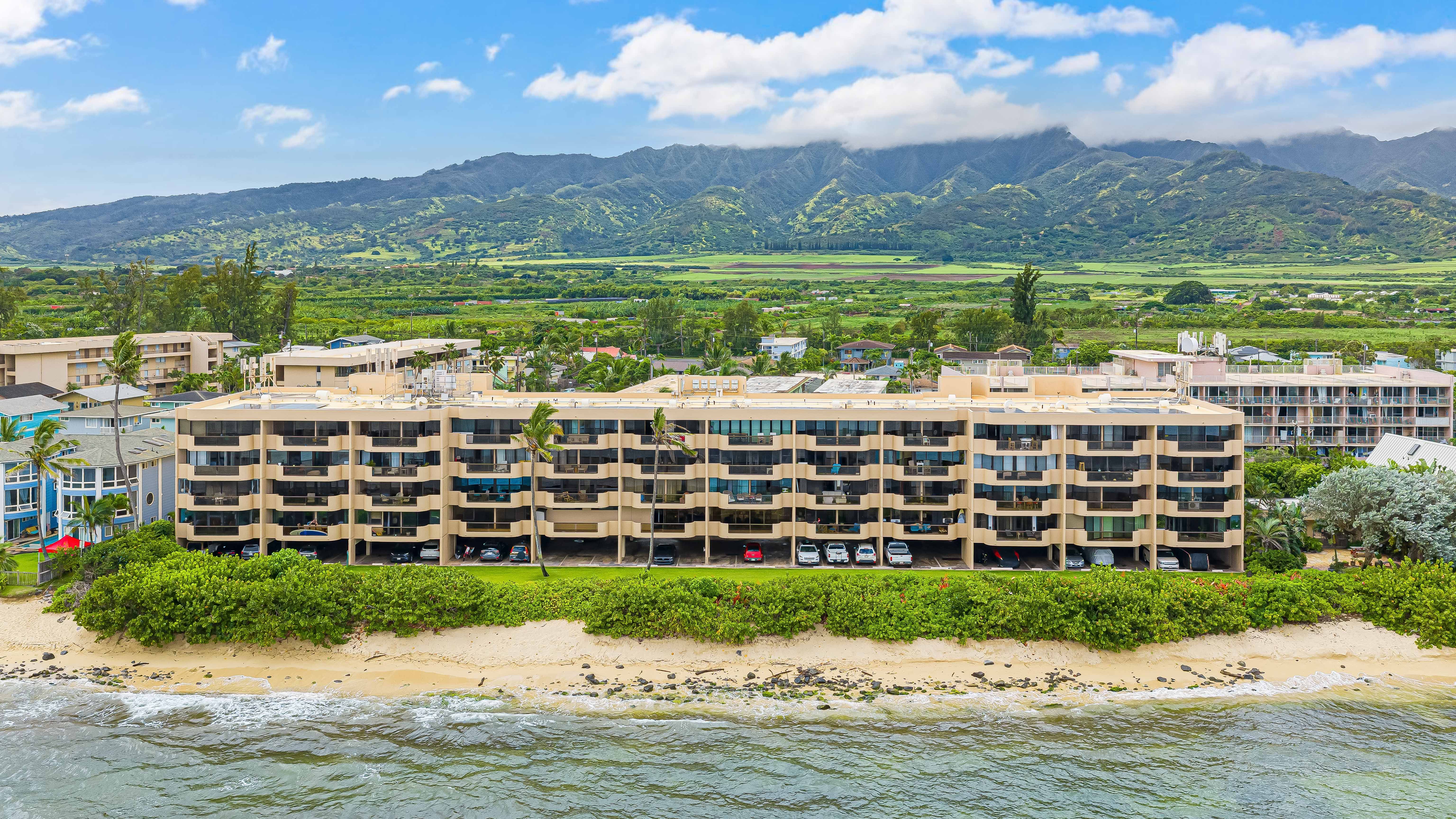 Stay steps from the ocean at this beachfront retreat