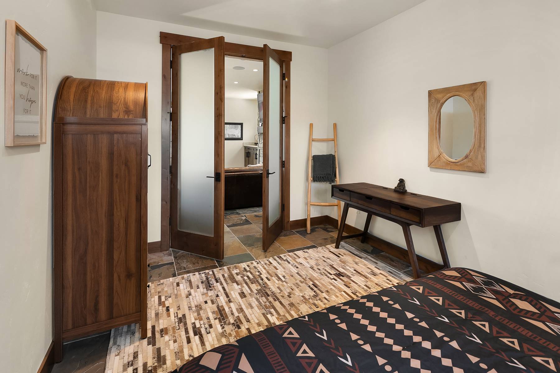 Main floor guest bedroom with a king bed. Just off the living room area. 