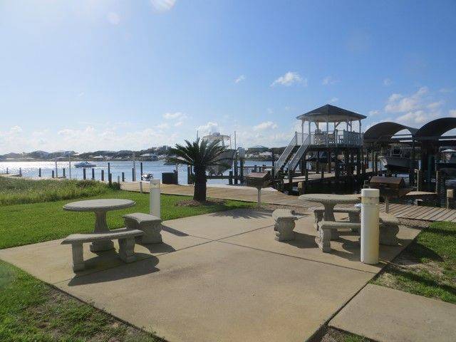 picnic area for guest to enjoy with grilling area and beautiful views of Ole River