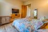 Bedroom Suite with a TV