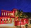 The villa entrance at night time
