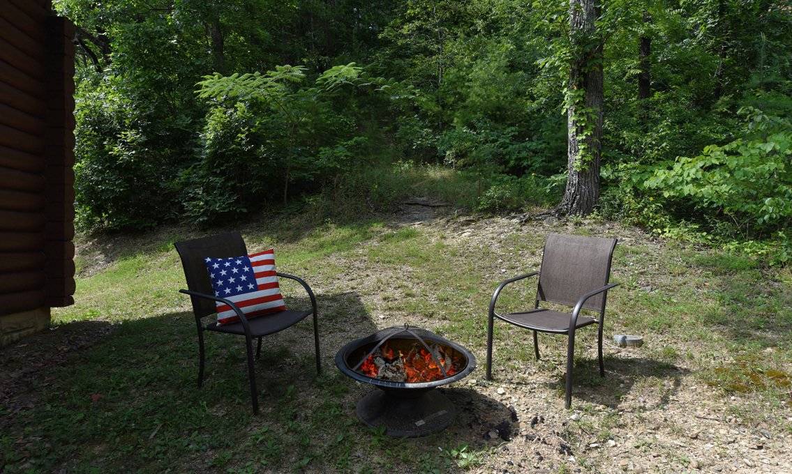 Roast marshmallows or sit back under the stars by the outdoor fi Roast marshmallows or sit back under the stars by the outdoor fi