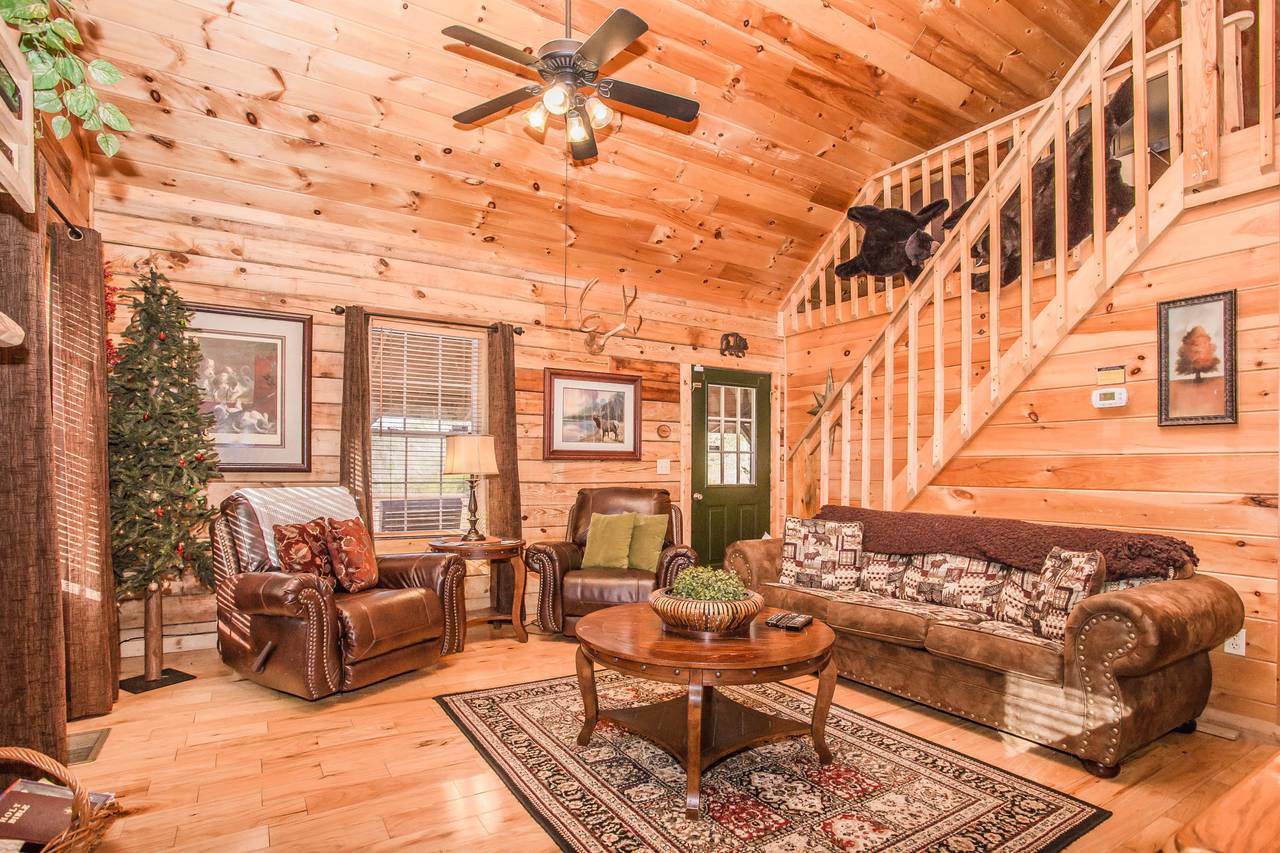 Plenty of seating in the living room for your entire group and a Plenty of seating in the living room for your entire group and a