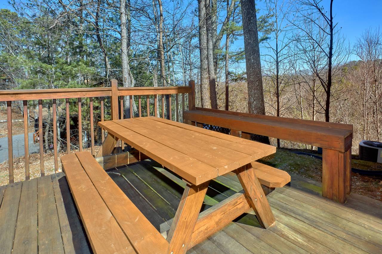 Outdoor picnic table and charcoal grill Outdoor picnic table and charcoal grill