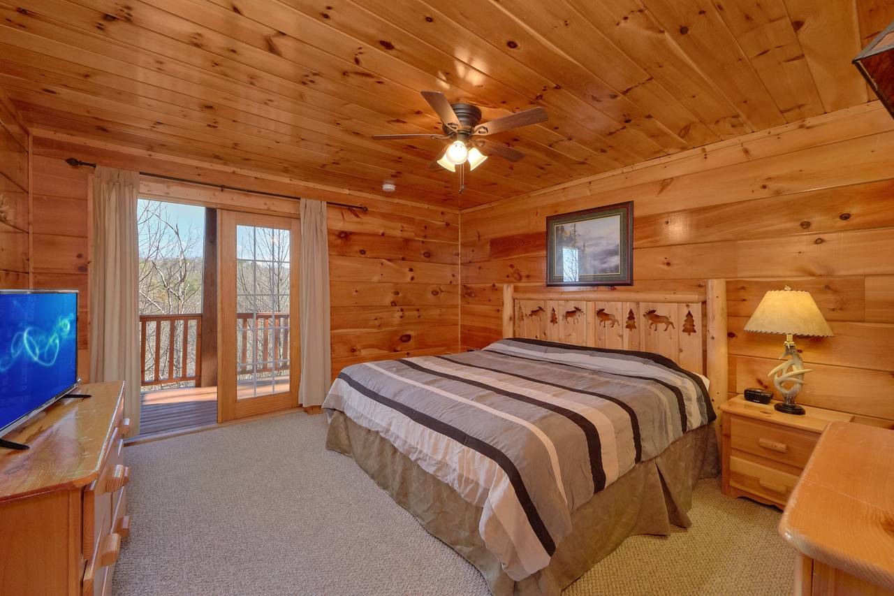 Bedroom 2 - King bed with deck entrance and flat screen TV. Bedroom 2 - King bed with deck entrance and flat screen TV.