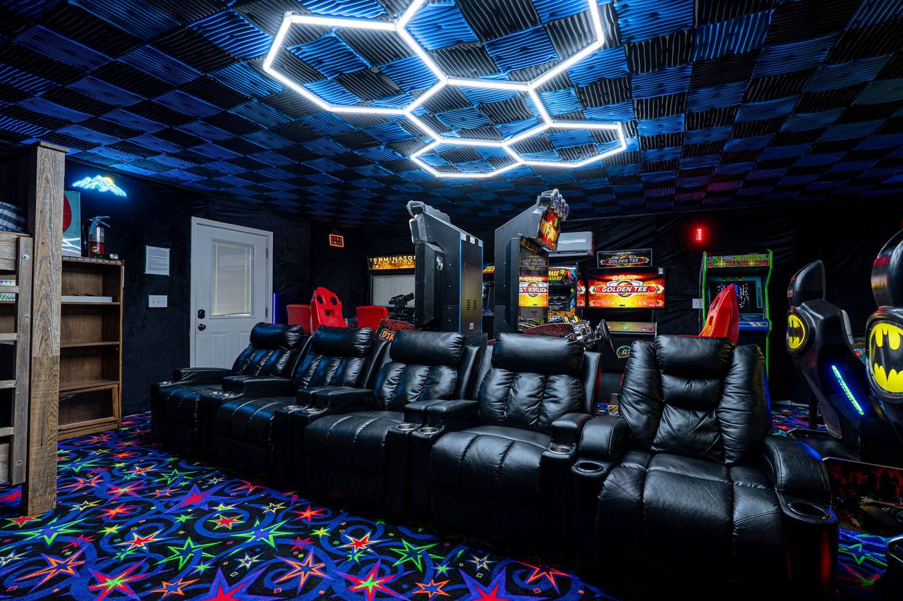 Theater seating and an 80” 4K screen for movies or gaming Theater seating and an 80” 4K screen for movies or gaming