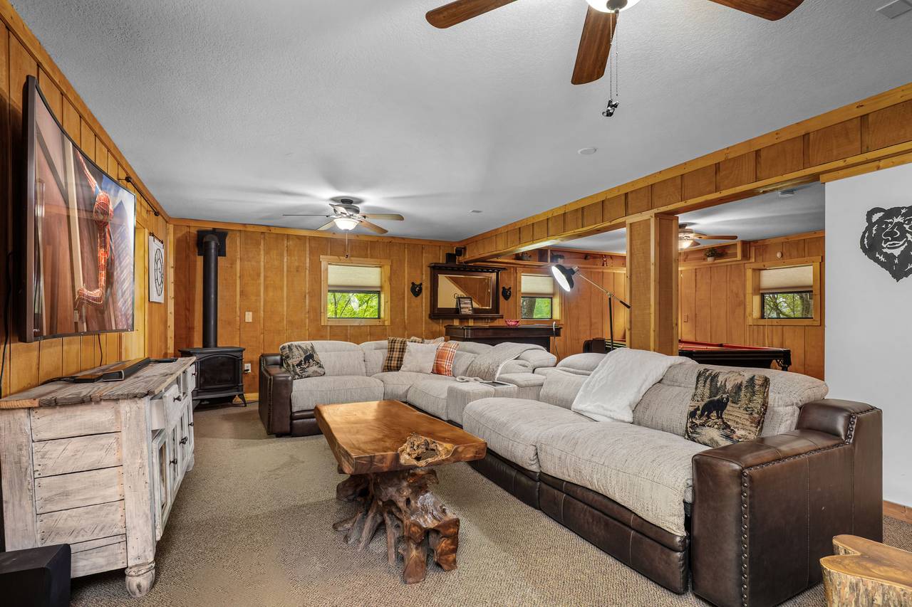 Lower-level living room with pool table and cozy vibes Lower-level living room with pool table and cozy vibes