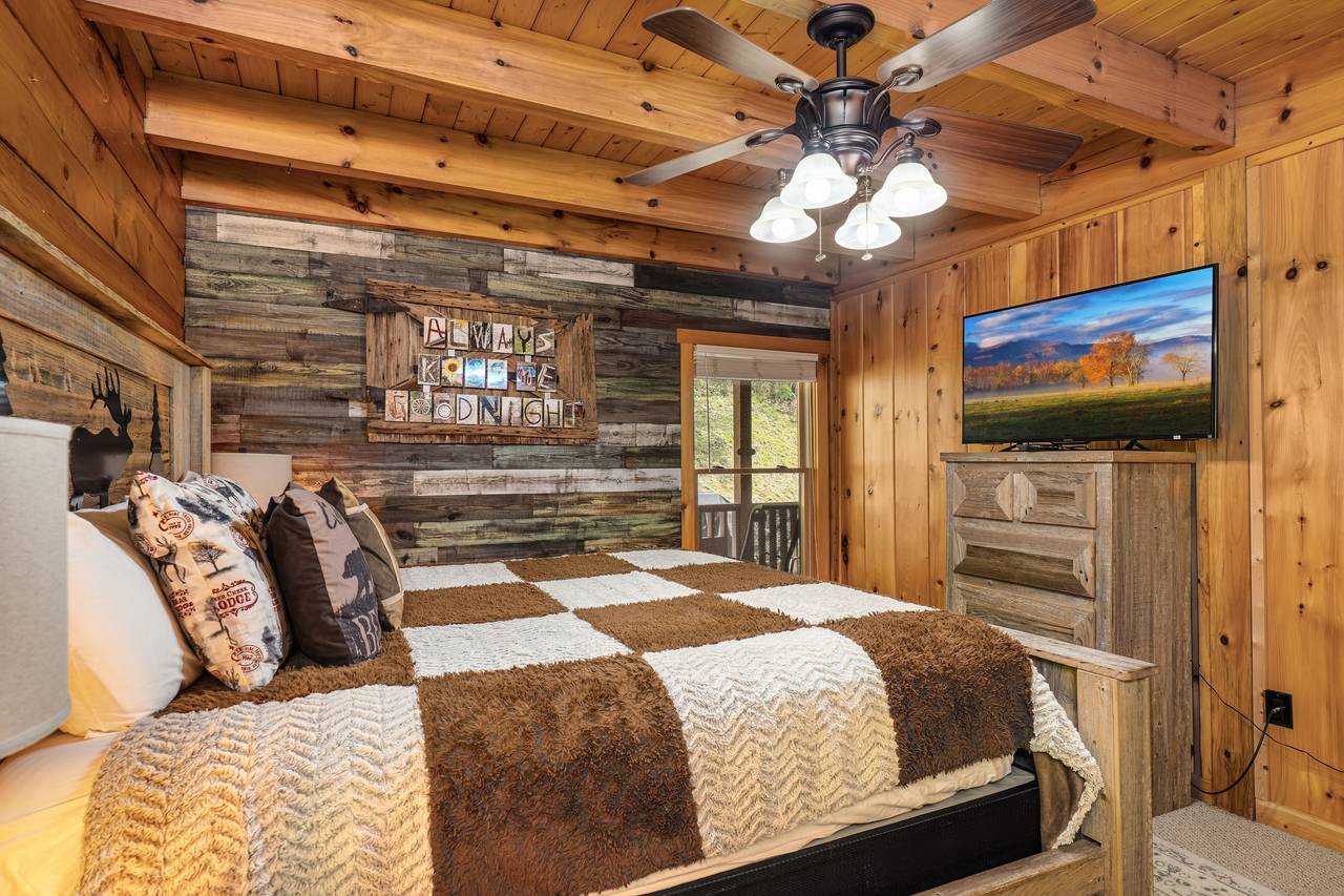 Entry-level king bedroom with cozy cabin charm Entry-level king bedroom with cozy cabin charm