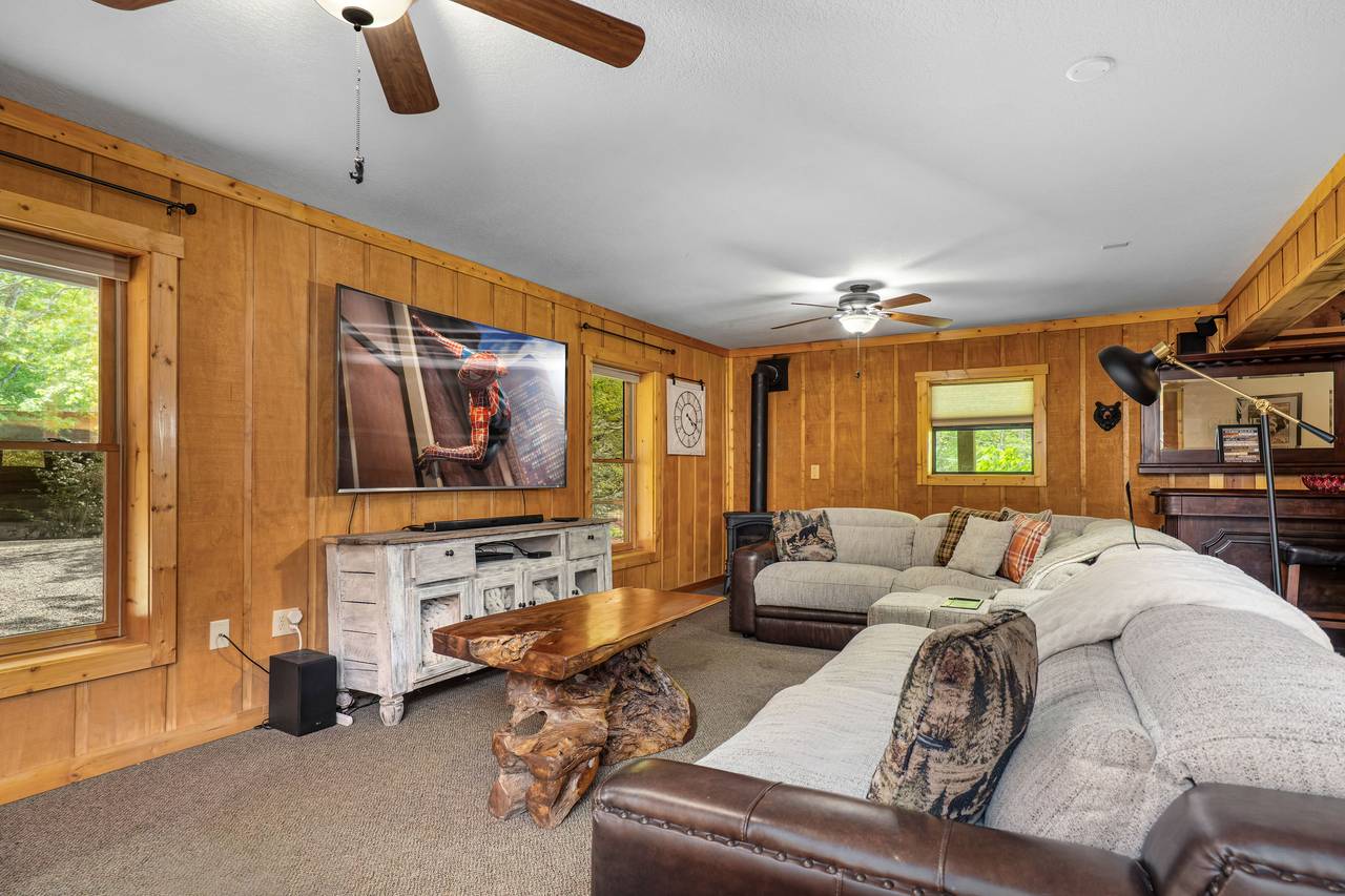 Lower-level living room with pool table and cozy vibes Lower-level living room with pool table and cozy vibes