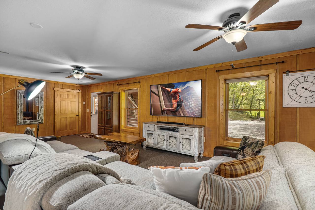 Lower-level living room with pool table and cozy vibes Lower-level living room with pool table and cozy vibes