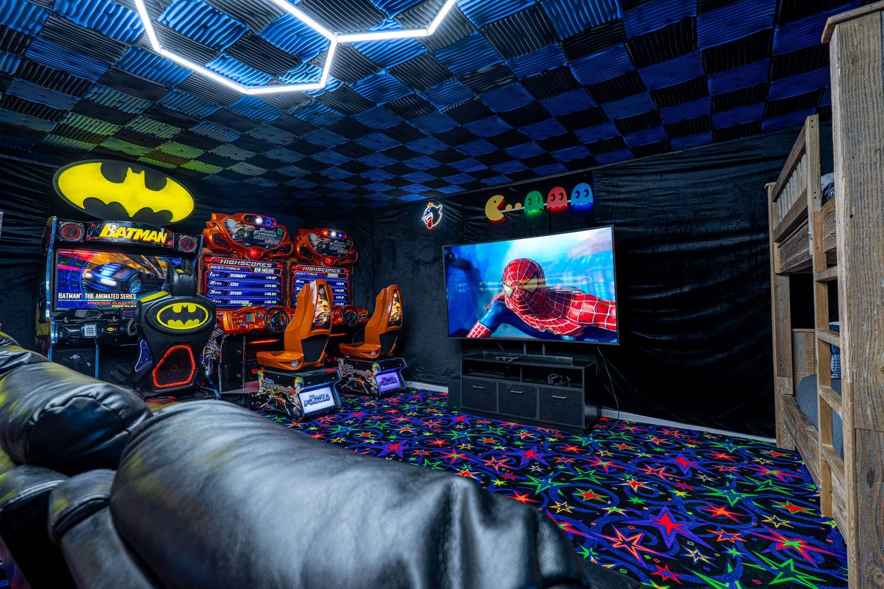 Theater seating and an 80” 4K screen for movies or gaming Theater seating and an 80” 4K screen for movies or gaming