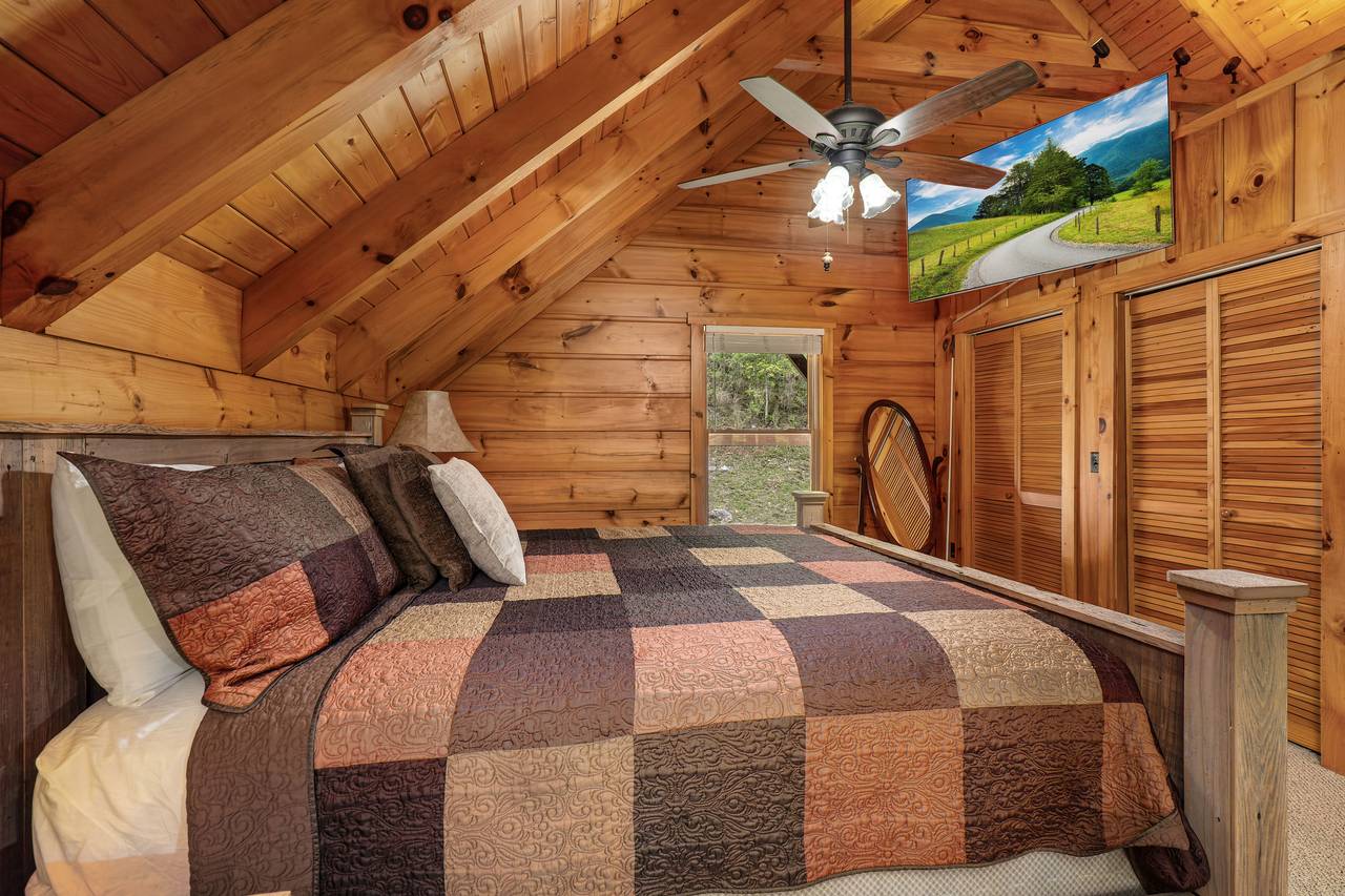Open-concept loft with plush king bed and Roku TV Open-concept loft with plush king bed and Roku TV