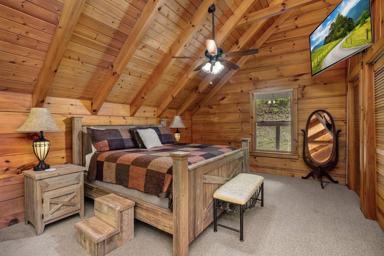 Open-concept loft with plush king bed and Roku TV Open-concept loft with plush king bed and Roku TV