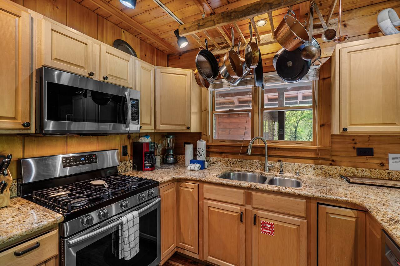 Fully equipped kitchen with modern appliances Fully equipped kitchen with modern appliances