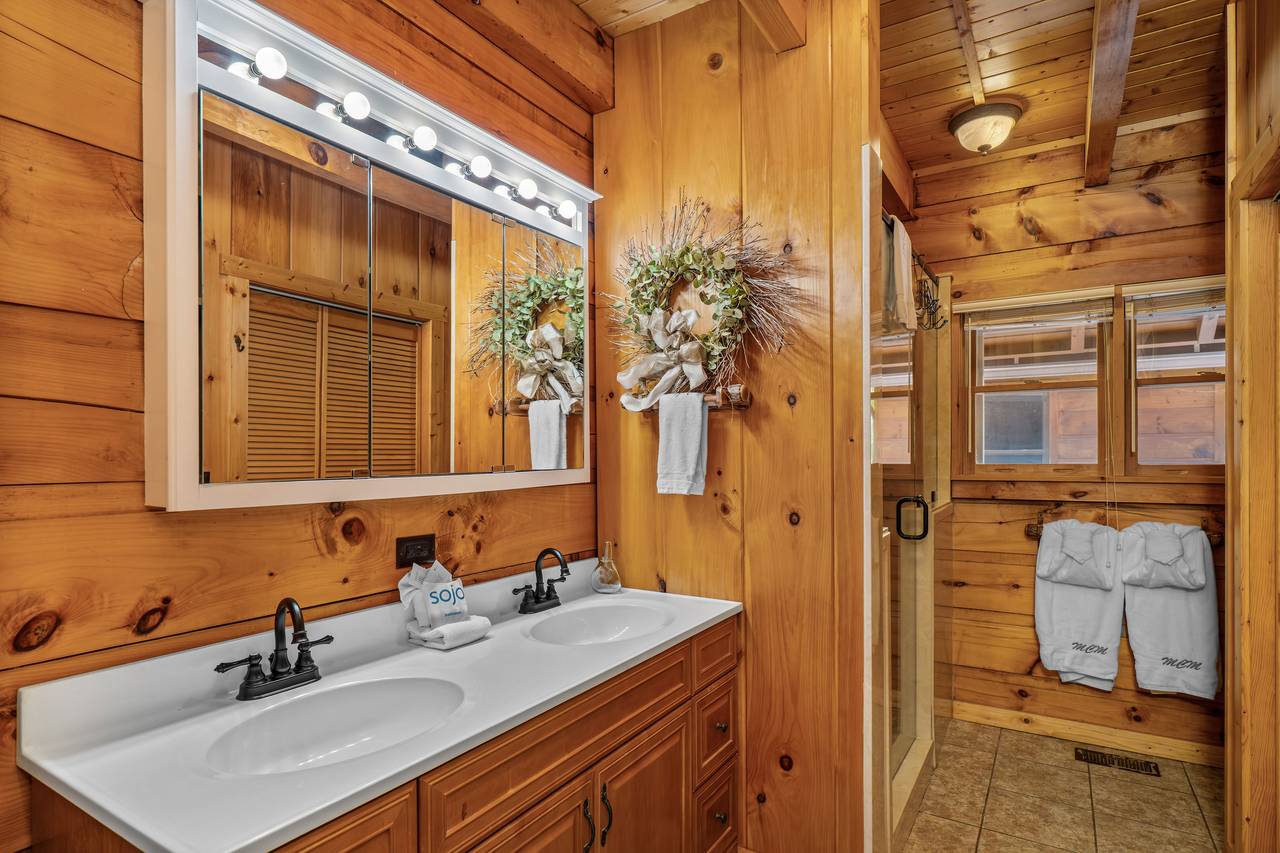 Main-level bath with walk-in shower and rustic charm Main-level bath with walk-in shower and rustic charm
