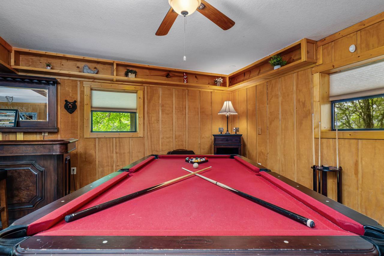 Lower level fun with TV, fireplace, and pool table Lower level fun with TV, fireplace, and pool table